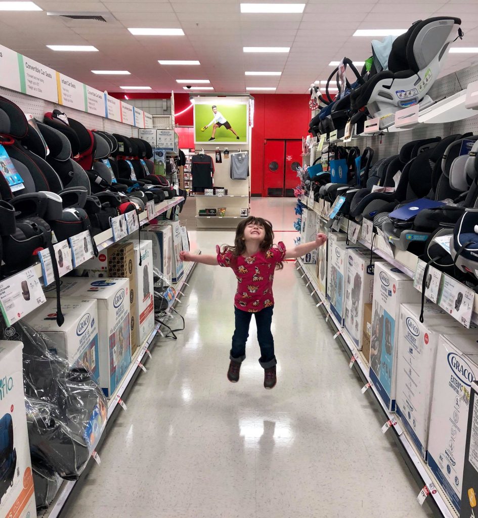 Excited Child in Baby Gear Aisle at Target