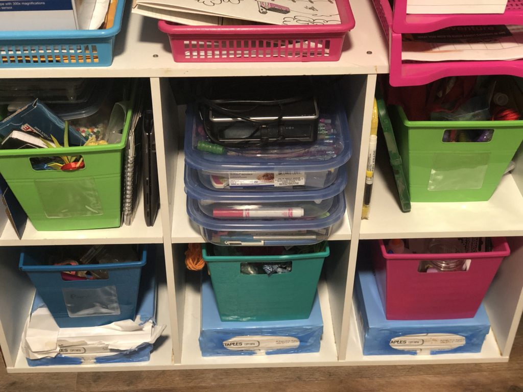 cubicles and dollar tree bins for organizing homeschool room